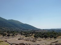Ancient Messene sneaks up on you, or. rather, you sneak up on it. There are three different views as you walk into it.The first is just a hill and a wall, the back wall of the theater. The second, the first real view of the site is from the top of that  hill. You can barely make out the Ascleipiion from here.  gr18 092412212 s-a
