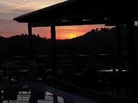 Sunset over the pool and terrace of the Taverna Bacchus, near Olympia.  gr18 091918330 k