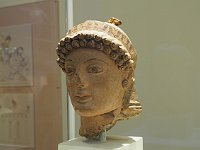 A clay head of Athena from the beginning of the 5th c. BCE. Isn't she beautiful?  gr18 092010510 k