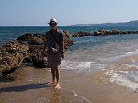 American tourist at Peroulia Beach.  gr18 092513430 k xy