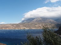 Across the bay, a cloud is stuck to the mountain.  gr18 092810371 s