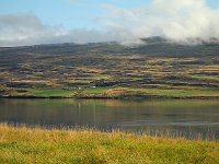 Looking across the fjord at hills on the other side