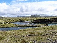 A river winds its way across the landscape.
