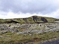 The dark spots on the hillside are steep ravines.