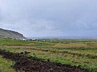 Looking towards the coast over a thin plain which was once under the sea