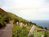 The Antrim Coast Road is really only one lane wide, so why do they paint a line down the middle?  Antrim Coast