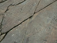 Curious ancient rock carvings at Achnabreck in Kilmartin Glen  Scottish Highlands, July 2006