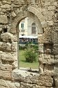 si13 052810174 j  Through a window of the Temple of Apollo, the daily market