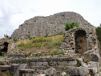 Priene  Ancient ruins at the base of the Mount Mycale, on the slopes of which the Greeks and their allies definitively defeated the Persian army in 479 BCE. On the top is the Acropolis, now unreachable after earthquakes.