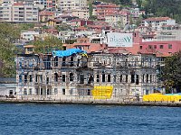 Istanbul - Bosphorus tour  The Bosphorus is lined with many old buildings, some of which are badly in need of repair. Fortunately, some, like this one, are being restored.