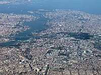 From plane, before landing  As the plane banked, we did not even know what incredible luck we were having. Shooting essentially blind out the airplane window, we got these great shots of downtown Istanbul. This one shows The Marmora Sea in the URH corner, the Golden Horn descending from it on the left. The right-hand peninsula is Sultanahmet and the greenery of Topkapi as well as Aya Sofia and the Blue Mosque can be made out. Closer, in the middle, one sees the Suleimaniye Mosque on a hilltop and, over the Golden Horn, three bridges, of which the farthest is the Galata Bridge.