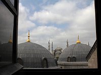 Istanbul - Sultanahmet  A lucky shot from a high window of the domes of the Aya Sofia mausoleums and, in the distance, the dome and minarets of the Blue Mosque