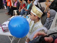 Promenades in Istanbul  Some politico gave this dressed-to-the-gills boy a balloon