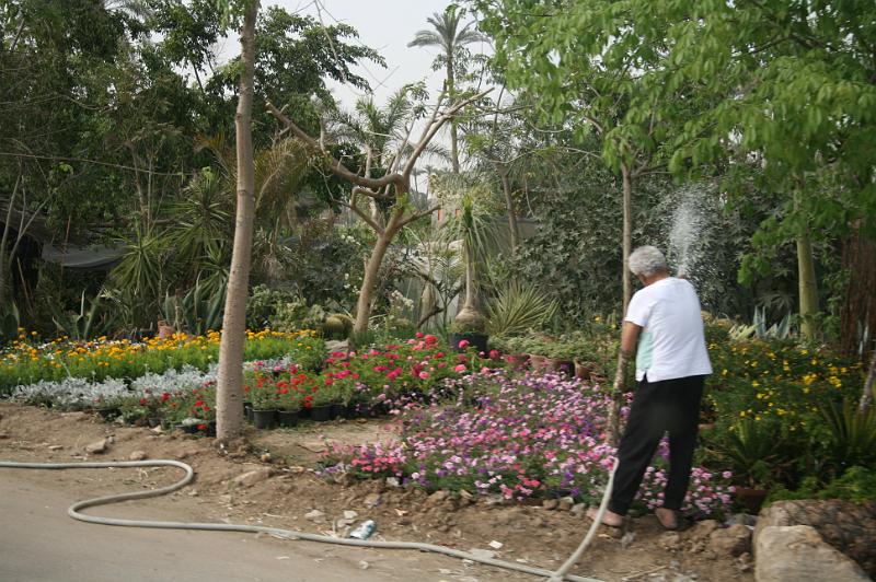 eg07_042716410_j.jpg - Watering his flowers