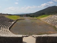 The stadium has horseshoe-shaped "bleachers" around three sides.  gr17 092010472 k