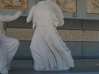 Athena's typical pose, probably brandishing a spear.  gr17 090816523 s