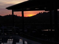 Sunset over the pool and terrace of the Taverna Bacchus, near Olympia.  gr18 091918330 k