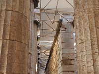Inside the outer row of columns.  gr18 092110464 k