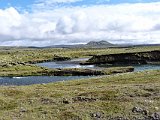 A river winds its way across the landscape.