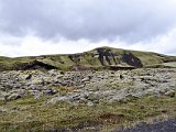 The dark spots on the hillside are steep ravines.
