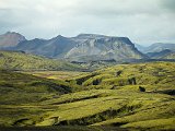 Coming up on the rhyolite mountains at Landmannalaugur, muted colors are slopes.