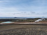 View over Mývatn, with steam from the geothermal plant on the righ