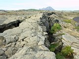 The fissure in which Grjótagjá lies points directly towards Hlíðarfjall.