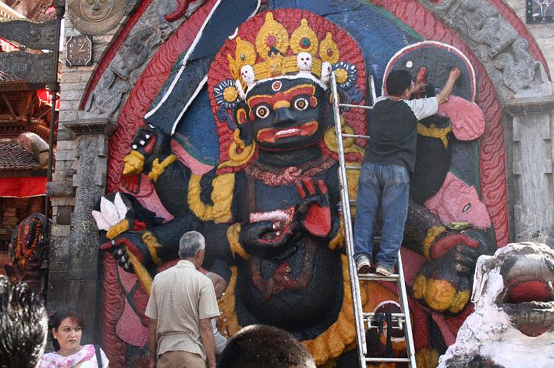 ne08_100414451_j_a.jpg - Painting the Kala (Black) Bhairab (terrible form of Shiva)