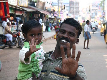 Friendly man with baby