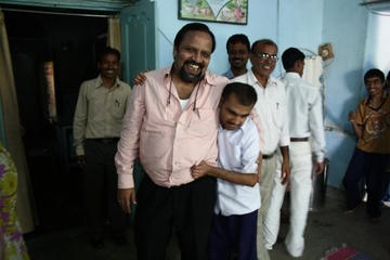 Tulsi and helper